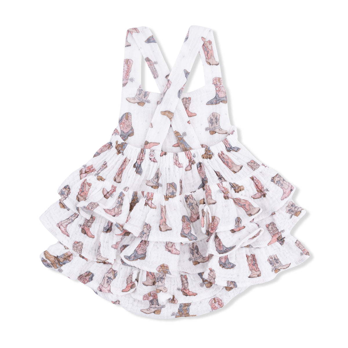White muslin baby girl sunsuit with cowgirl boots print, ruffles on the back and crisscross straps.