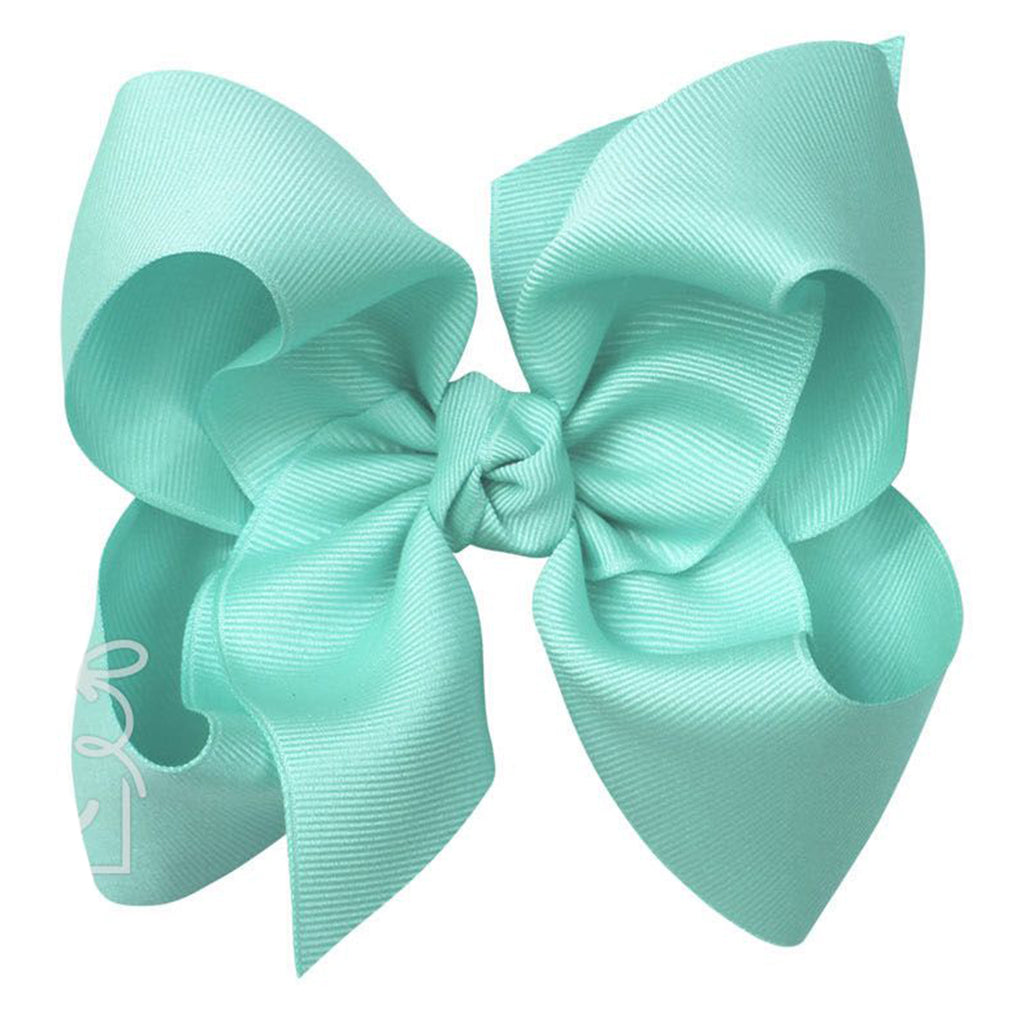 Large aquamarine green grosgrain classic hair bow with double knot center.