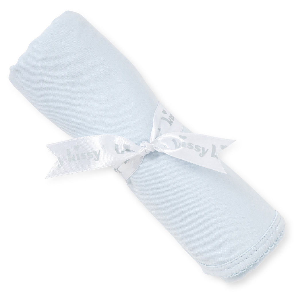Light blue baby blanket with light blue trim and Kissy Kissy branding