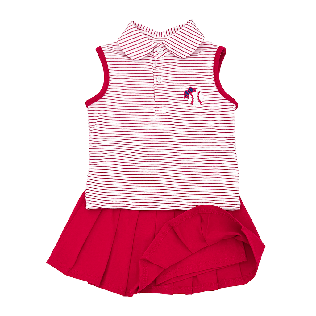 Striped sleeveless top with embroidered baseball and bow paired with a red pleated skort that shows the built-in shorts.