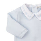 Light blue jacquard Pima cotton baby boy’s footed romper with white point collar embroidered in blue.