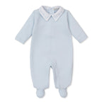 Light blue jacquard Pima cotton baby boy’s footed romper with white point collar embroidered in blue.