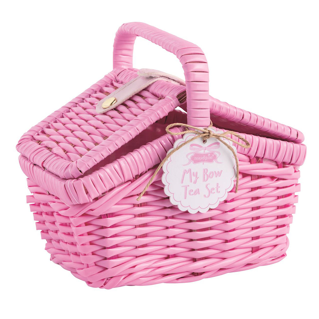 Pink wicker picnic basket with a tag that reads 'My Bow Tea Set'