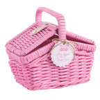 Pink wicker picnic basket with a tag that reads 'My Bow Tea Set'