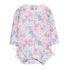 Girls long sleeve rashguard swimsuit with a pink bows and flowers design with bows at the hips.