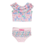 Girls two piece tankini bathing suit with pink striped ruffled bottoms and a ruffled top in a pink bows and flowers print.