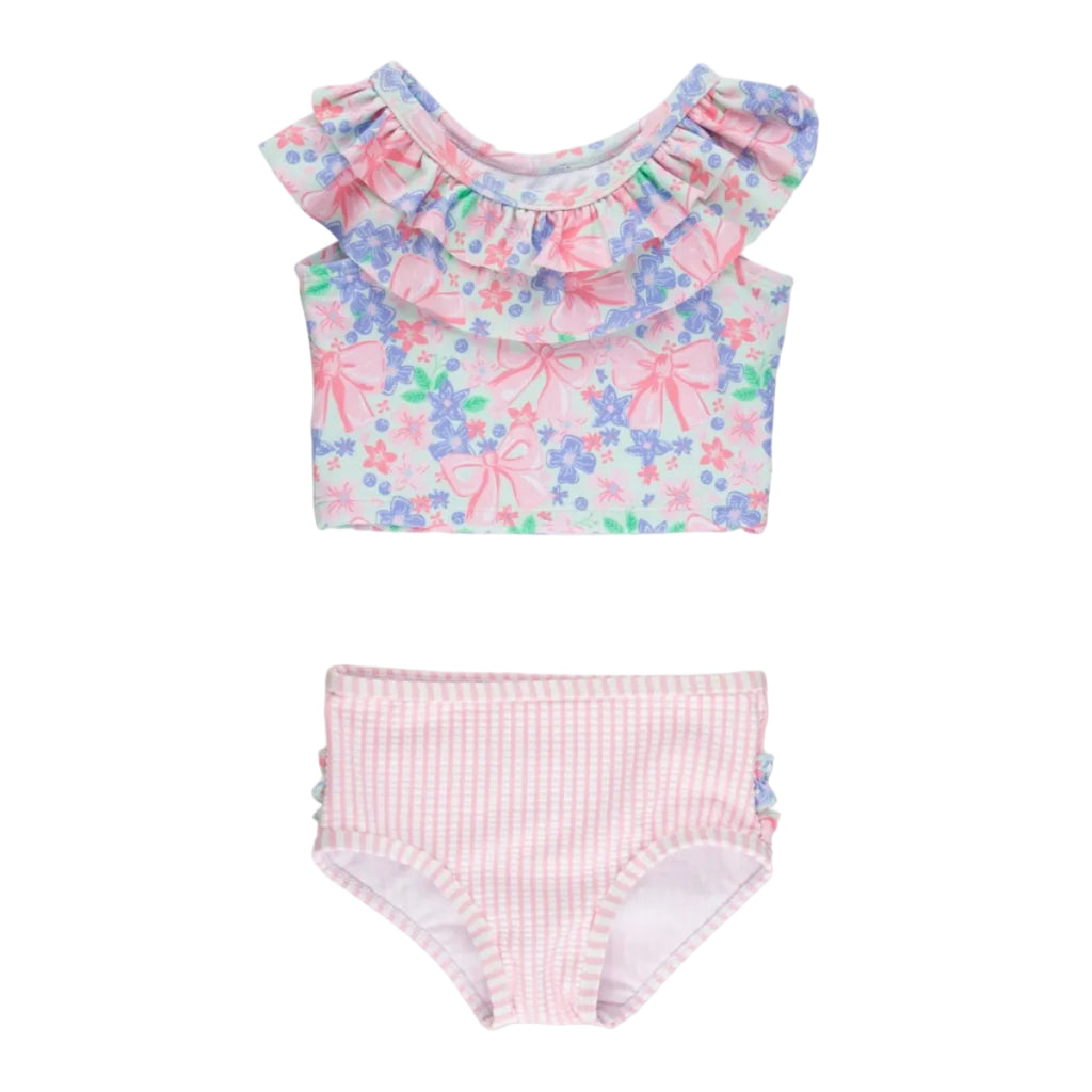 Girls two piece tankini bathing suit with pink striped bottoms and a ruffled top in a pink bows and flowers print.