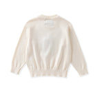 A cream-colored knit sweater shown from the back, featuring long sleeves, ribbed cuffs, and a ribbed hem, laid flat against a white background.