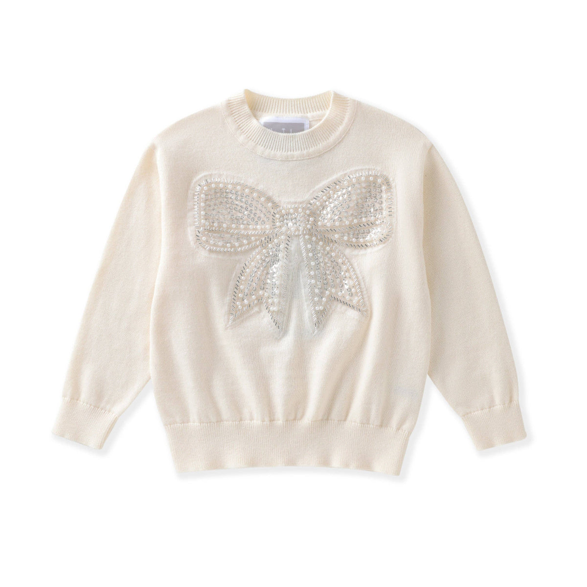 An off-white long-sleeve knit sweater featuring a large, textured bow embellished with shimmering silver rhinestones on the chest, displayed against a solid white background.