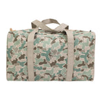 Camouflage-patterned duffel bag with beige straps.