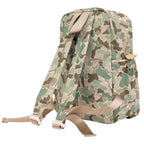 Shoulder strap view of a camouflage patterned laminated backpack.