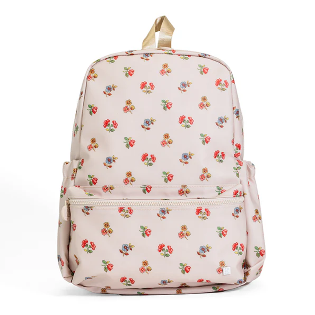 Floral-patterned TRVL Design backpack.
