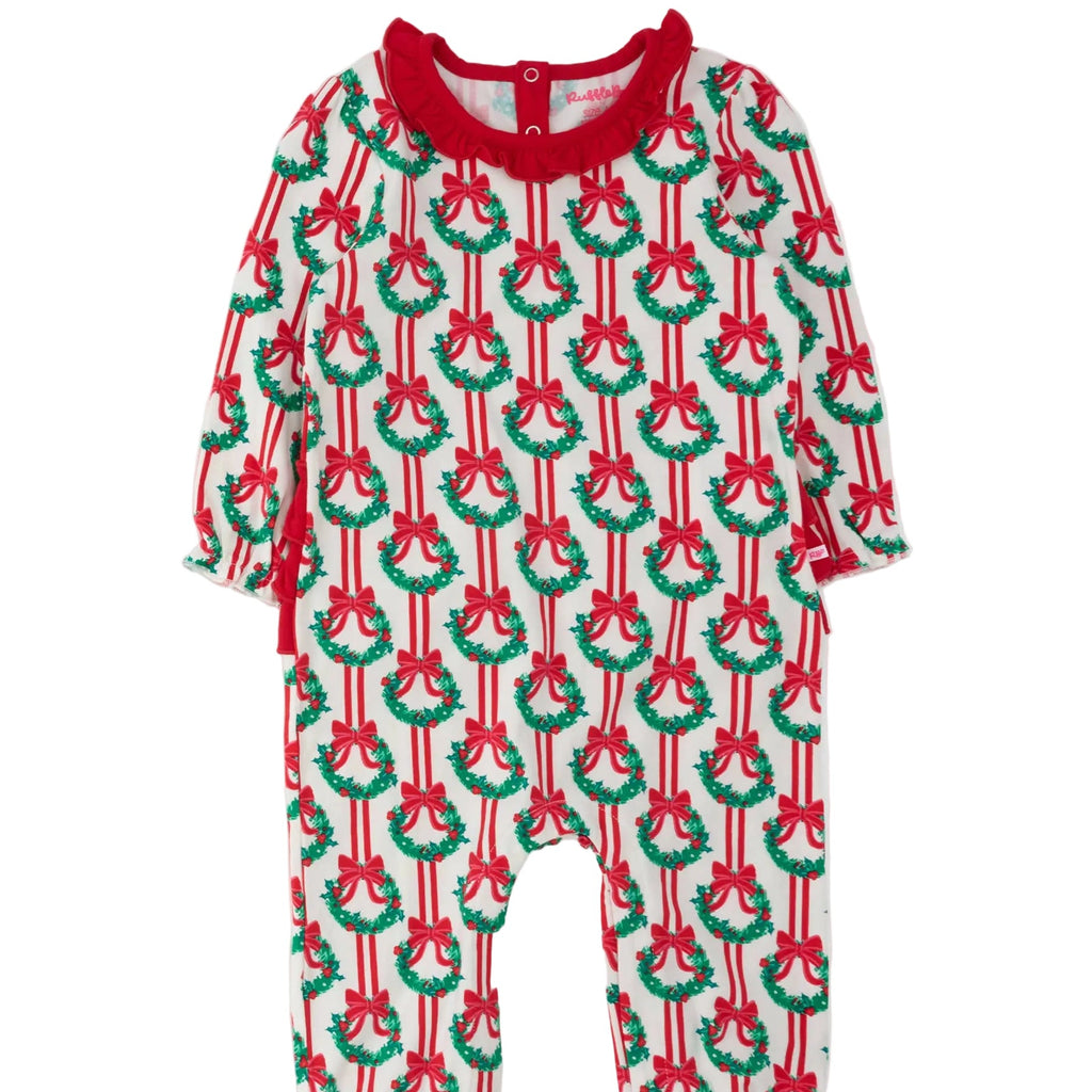 A baby long-sleeve footless one-piece jumpsuit featuring a festive Christmas wreath and candy cane pattern on a white background, with a contrasting red collar and red side ties.