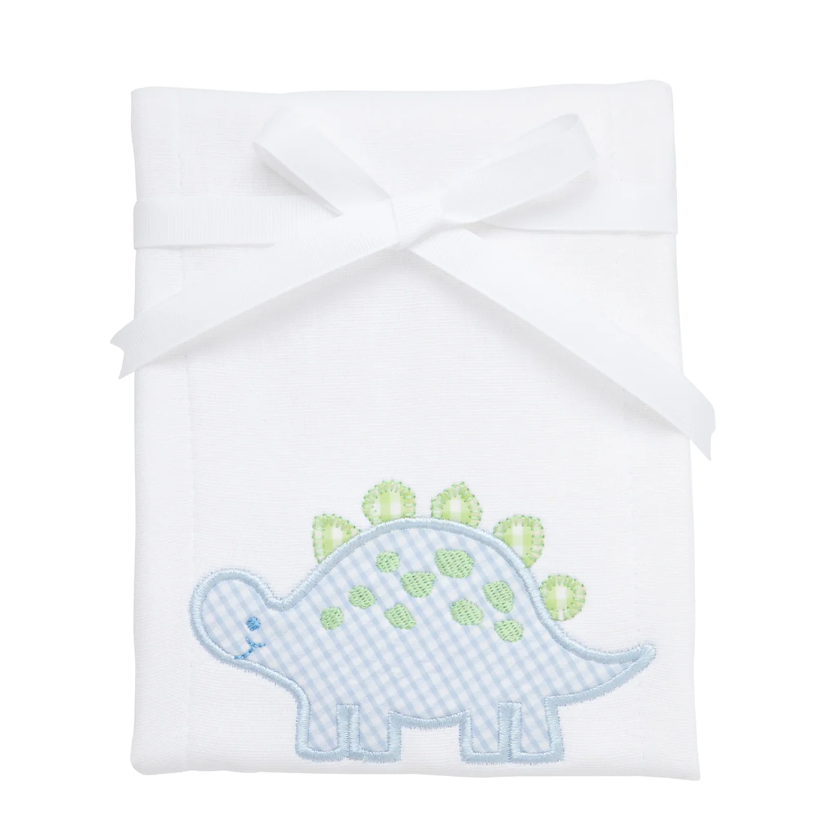 White baby burp pad with a blue dinosaur applique and a ribbon tie