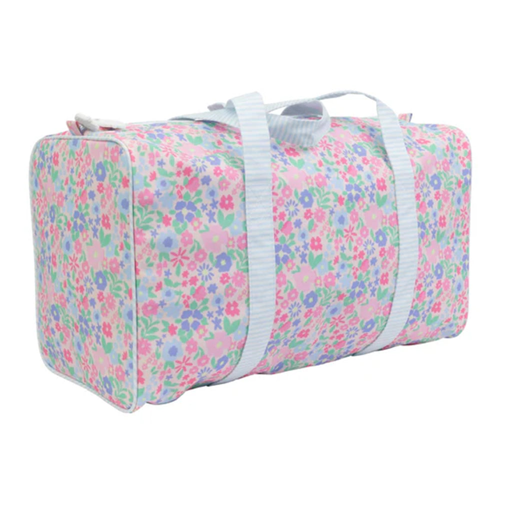 Pink, blue, and lavender floral duffel bag with blue and white stripe straps.