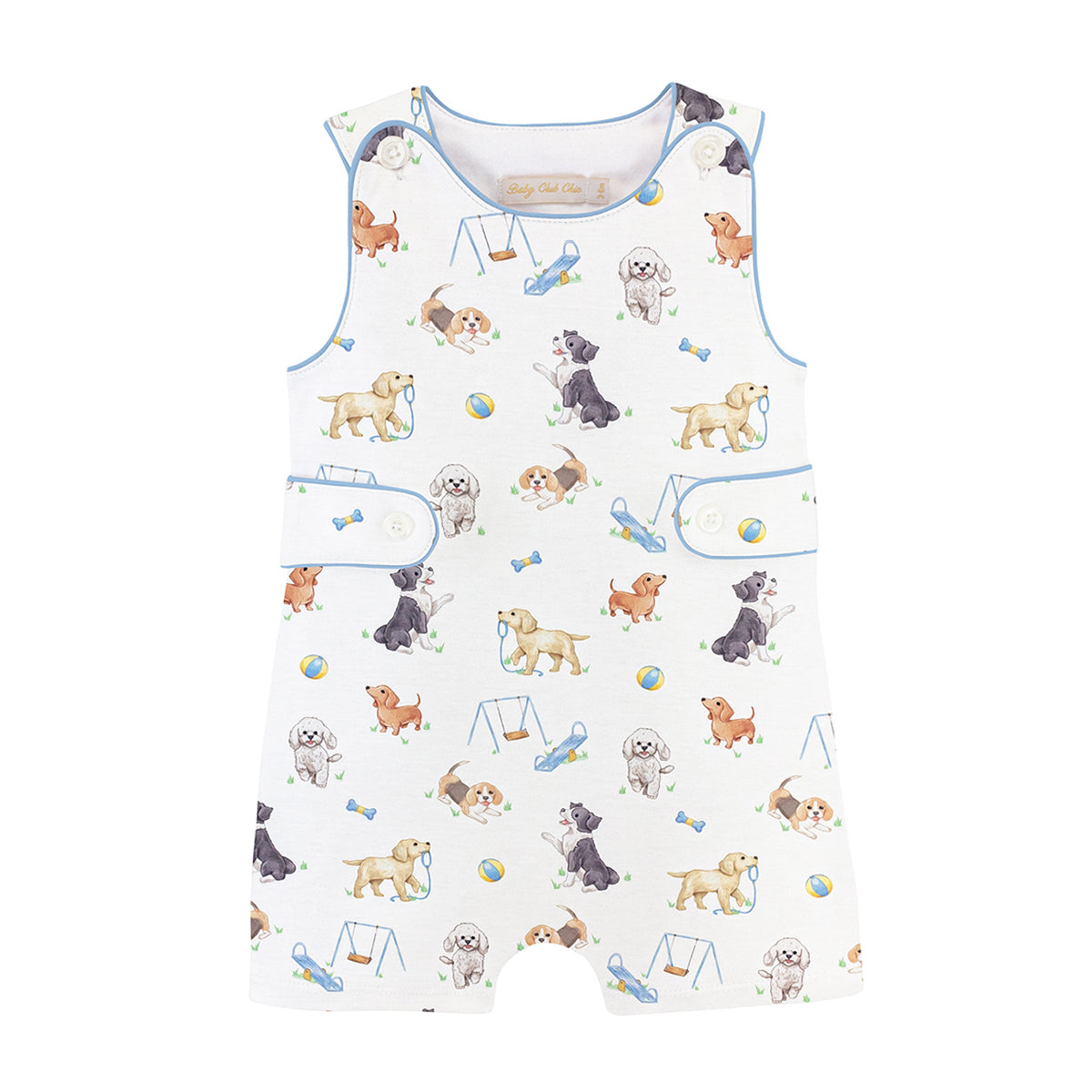 Boy's jon-jon with side tabs and a print of puppy dogs playing at the park.