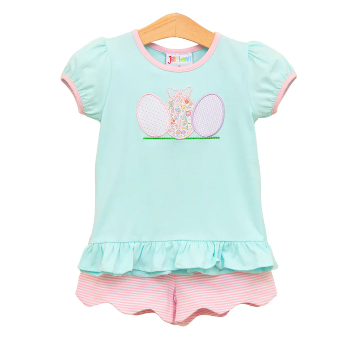 Toddler girl's Easter outfit with a mint ruffled top with appliqued eggs and pink stripe scalloped shorts
