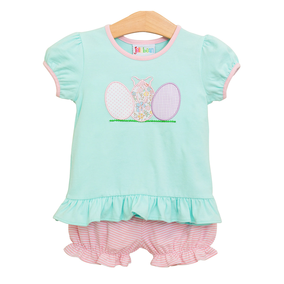 Mint green short sleeve shirt with ruffles, pink trim and appliqued Easter eggs with pink and white stripe bloomers. 