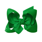 Green grosgrain classic hair bow with double knot center.