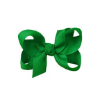 Green grosgrain classic hair bow with double knot center.