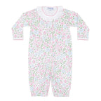 Pastel floral garden print baby girl converter gown with a white ruffle at the neck and pink trim.