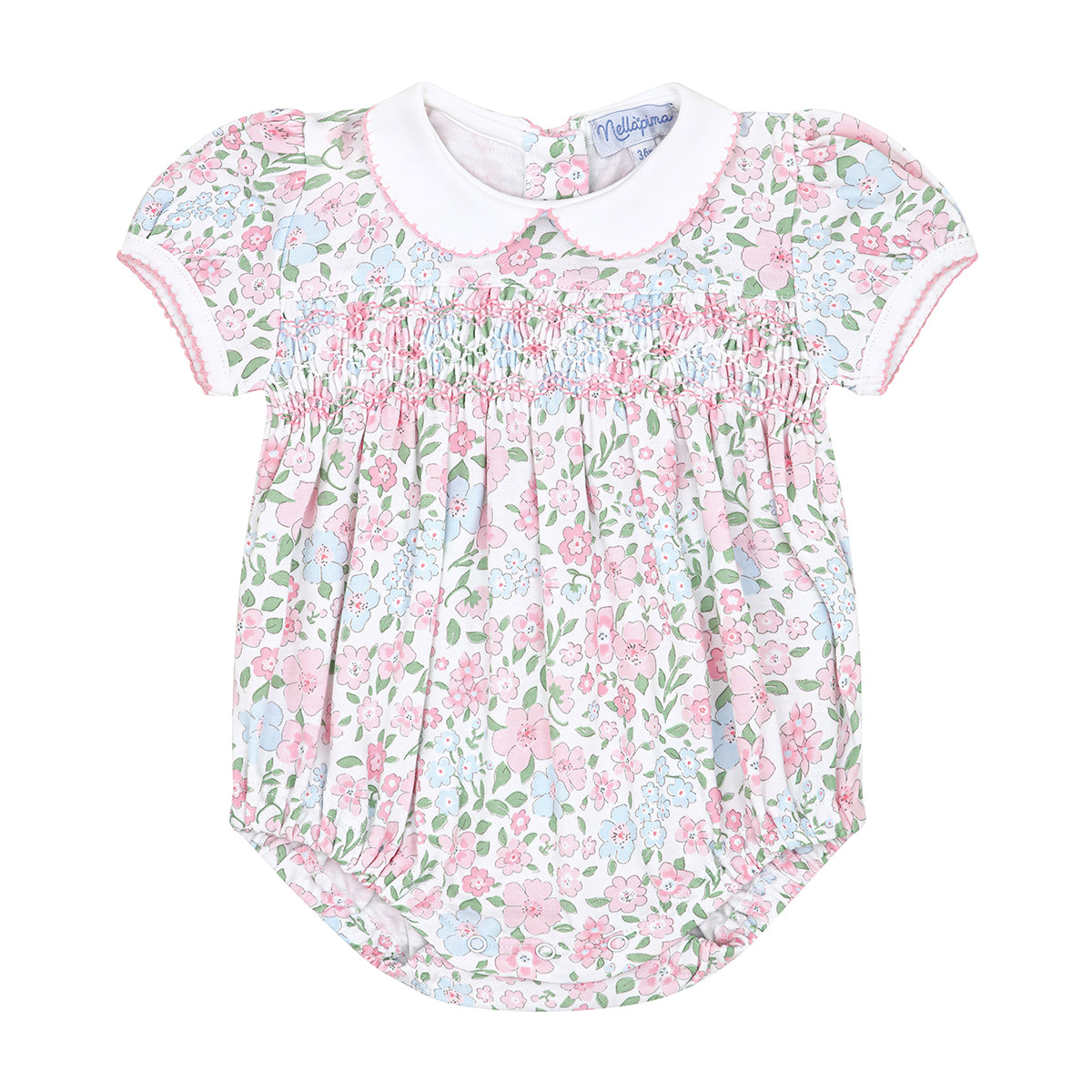 Pastel floral garden print girl's short bubble with smocking and a white collar.