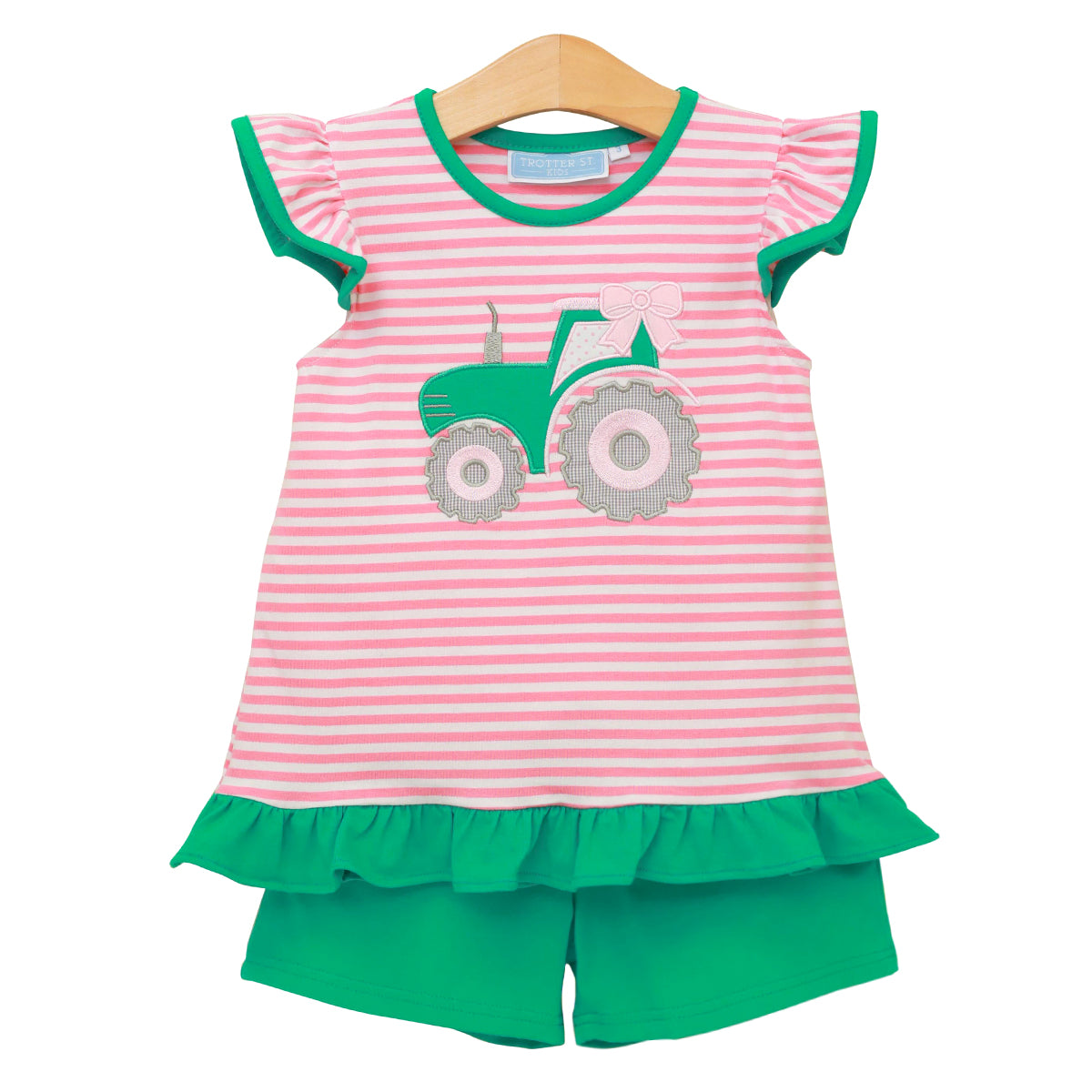 Girls pink striped flutter sleeve shirt with a green tractor applique and coordinating green knit shorts with ruffles