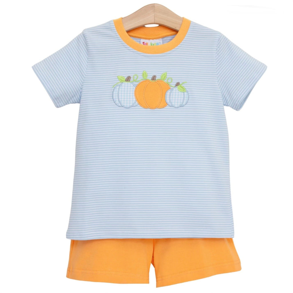 A toddler's two-piece short set in light blue and white stripes, featuring orange trim on the crew neck and sleeve cuffs, and an appliqued pumpkin design on the chest.