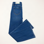 A pair of medium blue denim jeans folded to show the back pocket and leg construction, photographed on a plain white background.