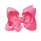 Hot pink grosgrain classic hair bow with double knot center.