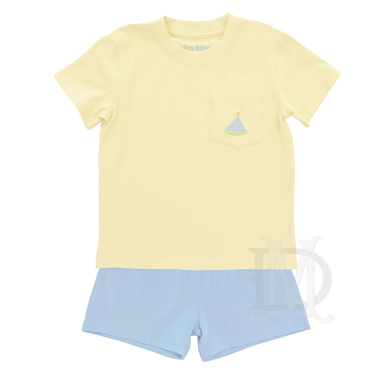 Boys pale yellow short sleeve t-shirt with a light blue sailboat embroidery on the pocket and light blue knit shorts.