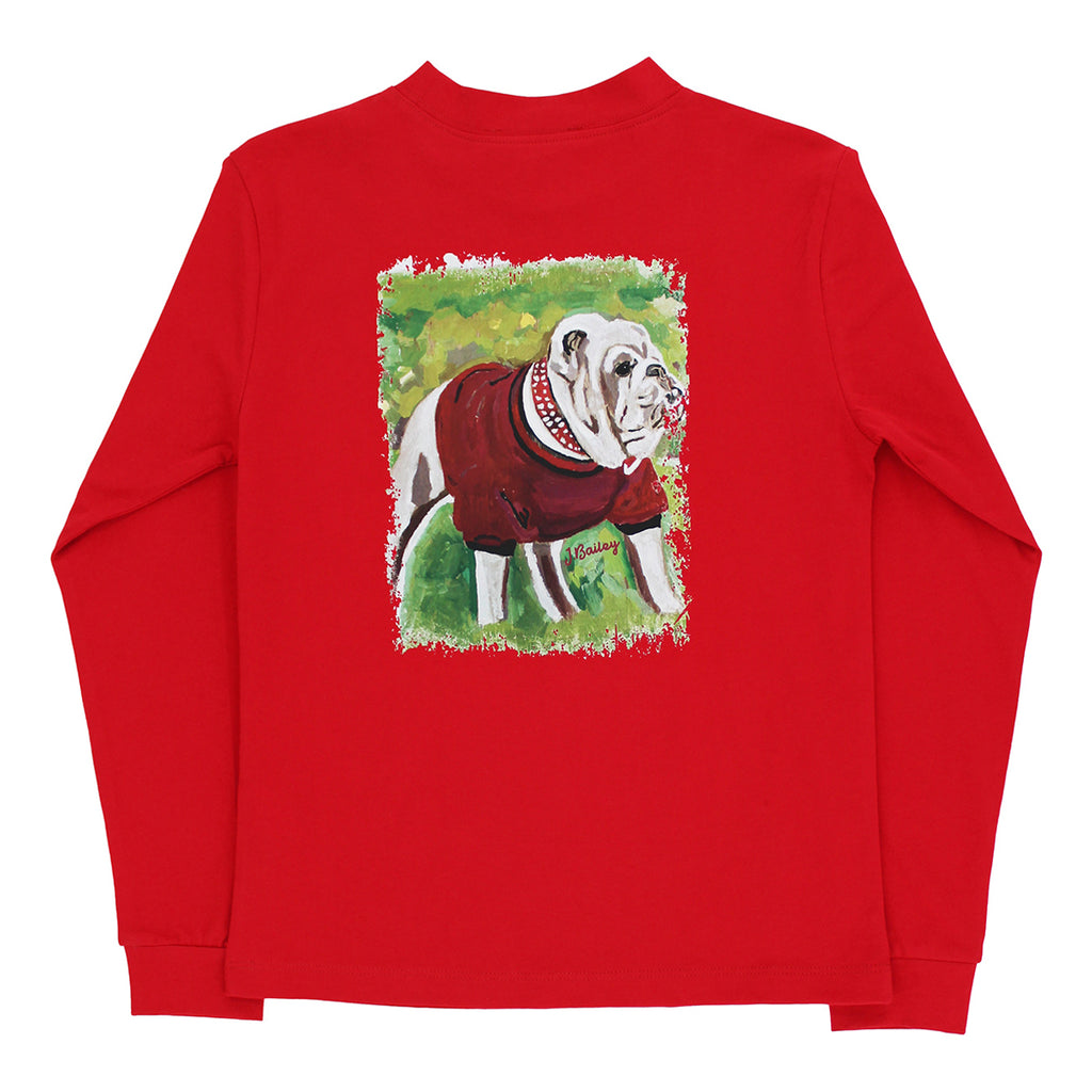 A red long-sleeve t-shirt with a square graphic print on the back showing an illustration of a white bulldog wearing a red sweater on a football field.