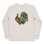 A light heather beige long-sleeve t-shirt with a colorful graphic of a turkey on the back.