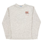 A girl's light heather beige long-sleeve crewneck sweatshirt with a pink bow and a J. Bailey logo on the front.