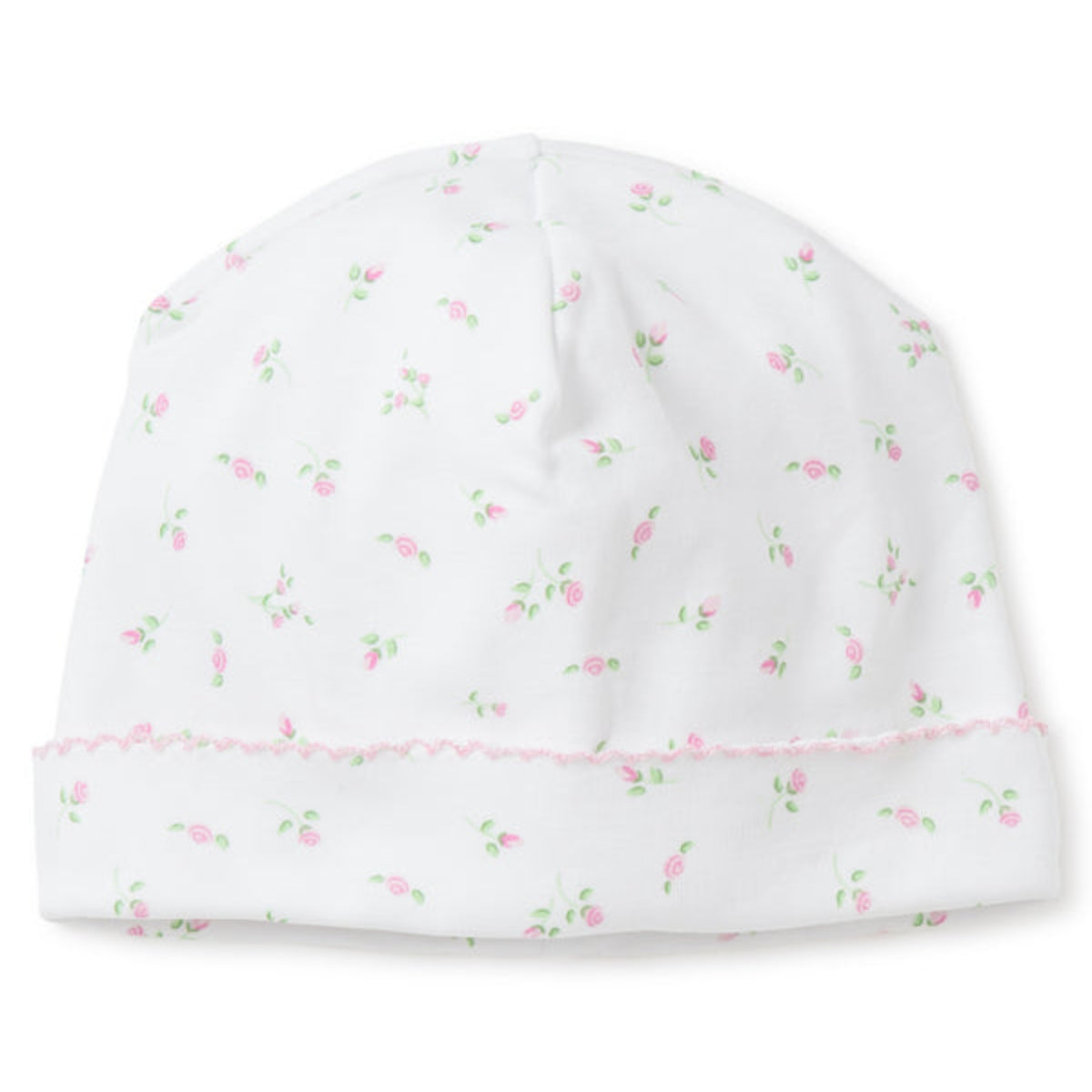 White baby hat with pink rosebud pattern on a white background