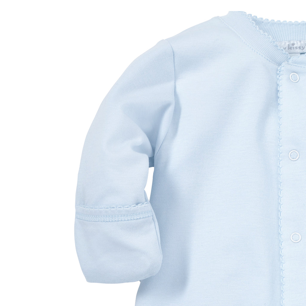 Closeup of a light blue baby boy converter gown showing foldover mittens and Kissy Kissy tag