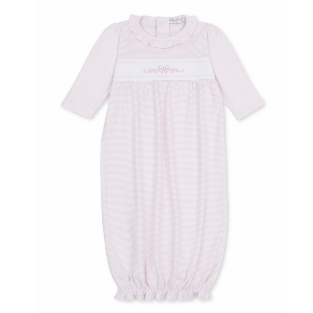 A girl’s long-sleeve baby sack in pale pink and white stripes, featuring a ruffled collar and pink bow and floral embroidery.