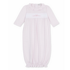 A girl’s long-sleeve baby sack in pale pink and white stripes, featuring a ruffled collar and pink bow and floral embroidery.
