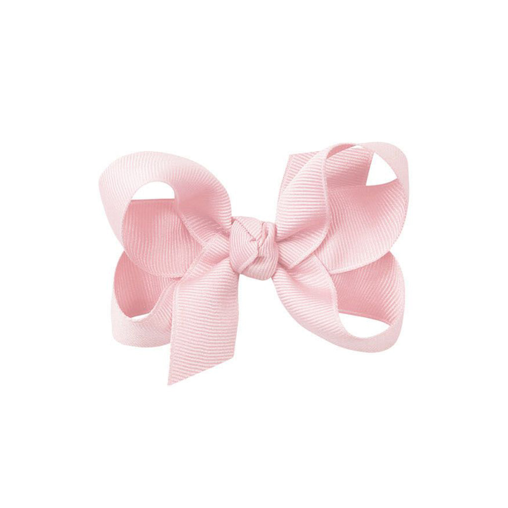 Light pink grosgrain classic hair bow with double knot center.
