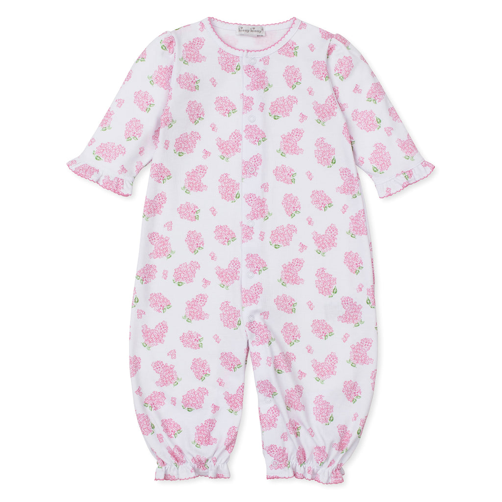 Baby girl converter gown with pink hydrangea floral pattern and Kissy Kissy brand label