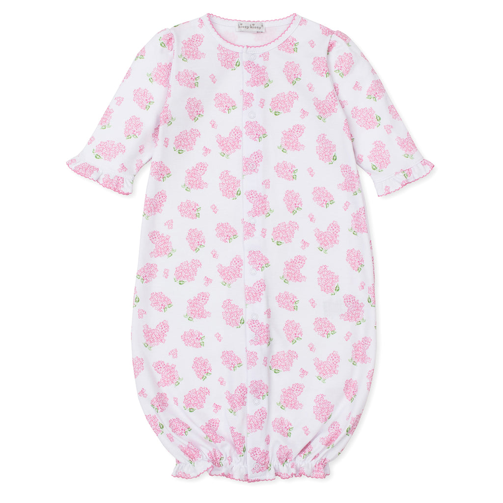 Baby gown with pink hydrangea floral pattern and Kissy Kissy brand label