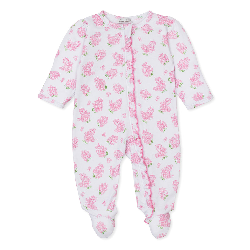Baby girl zip front footie with pink hydrangea floral pattern, ruffle trim, and Kissy Kissy brand label