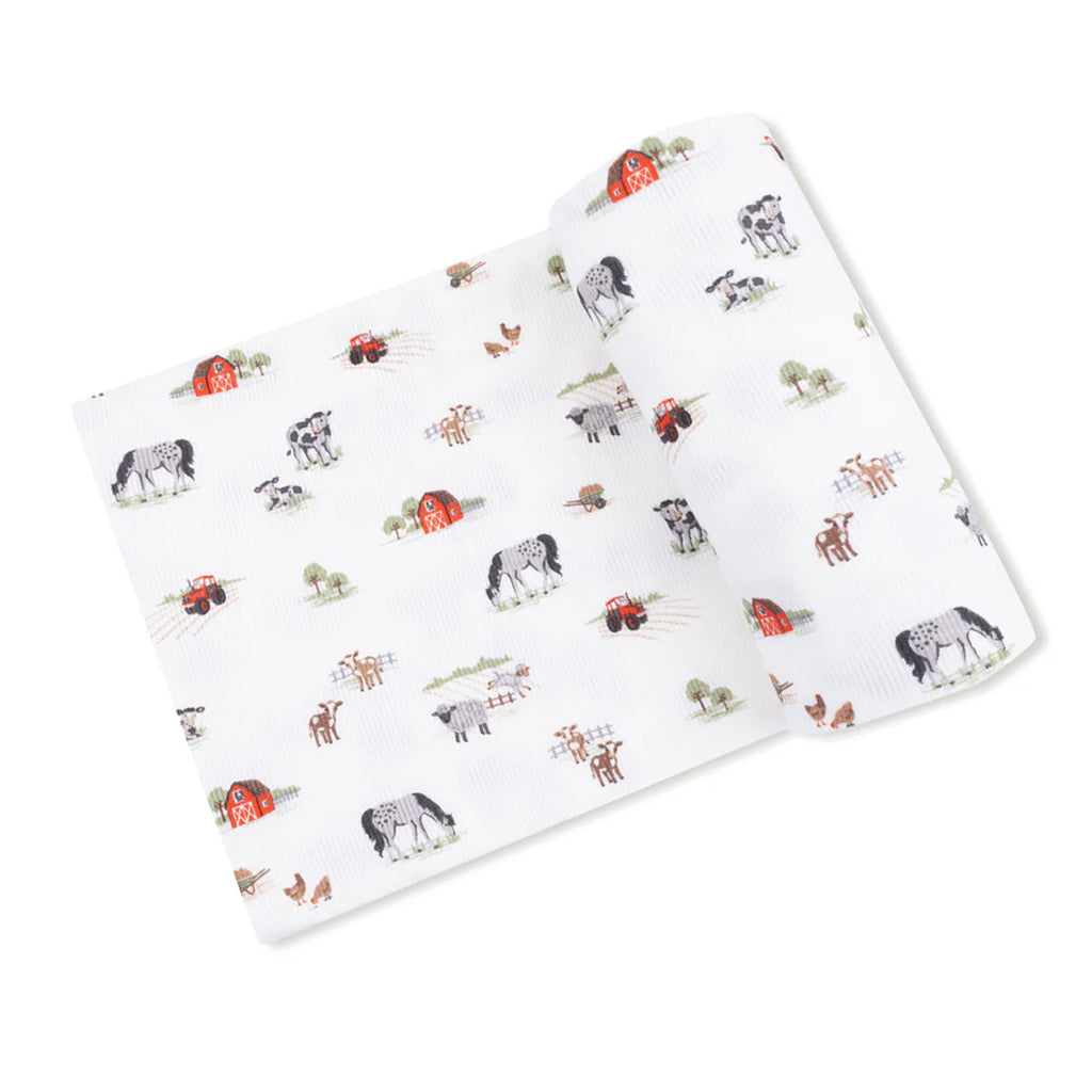 Baby swaddle blanket in ribbed modal ultra soft fabric with a precious farm animal pattern