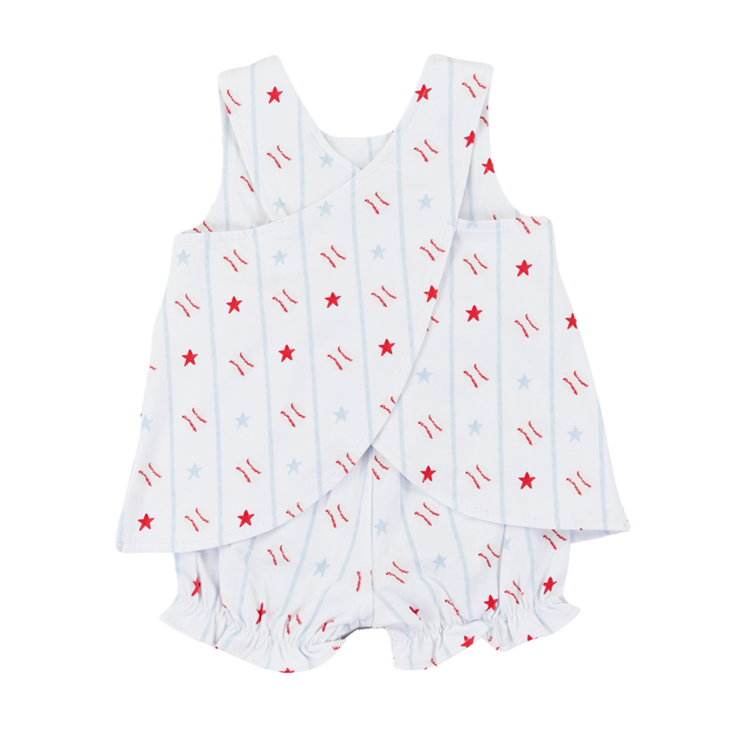 Back view of a girl's baseball print crossback bloomer set red and light blue outfit.