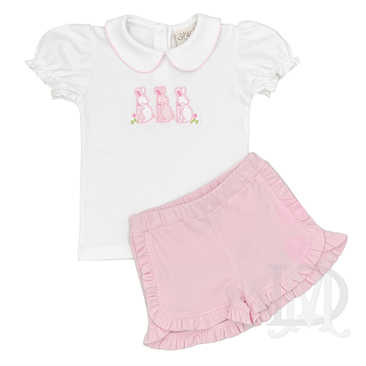 Girls white short sleeve top with three pink appliqued bunnies and pink ruffled shorts