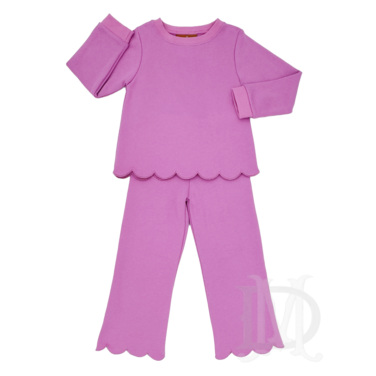 A two-piece little girl's pants set in a vibrant pinkish-purple magenta shade featuring a long-sleeve top with a scalloped hem and matching pants with scalloped hems.