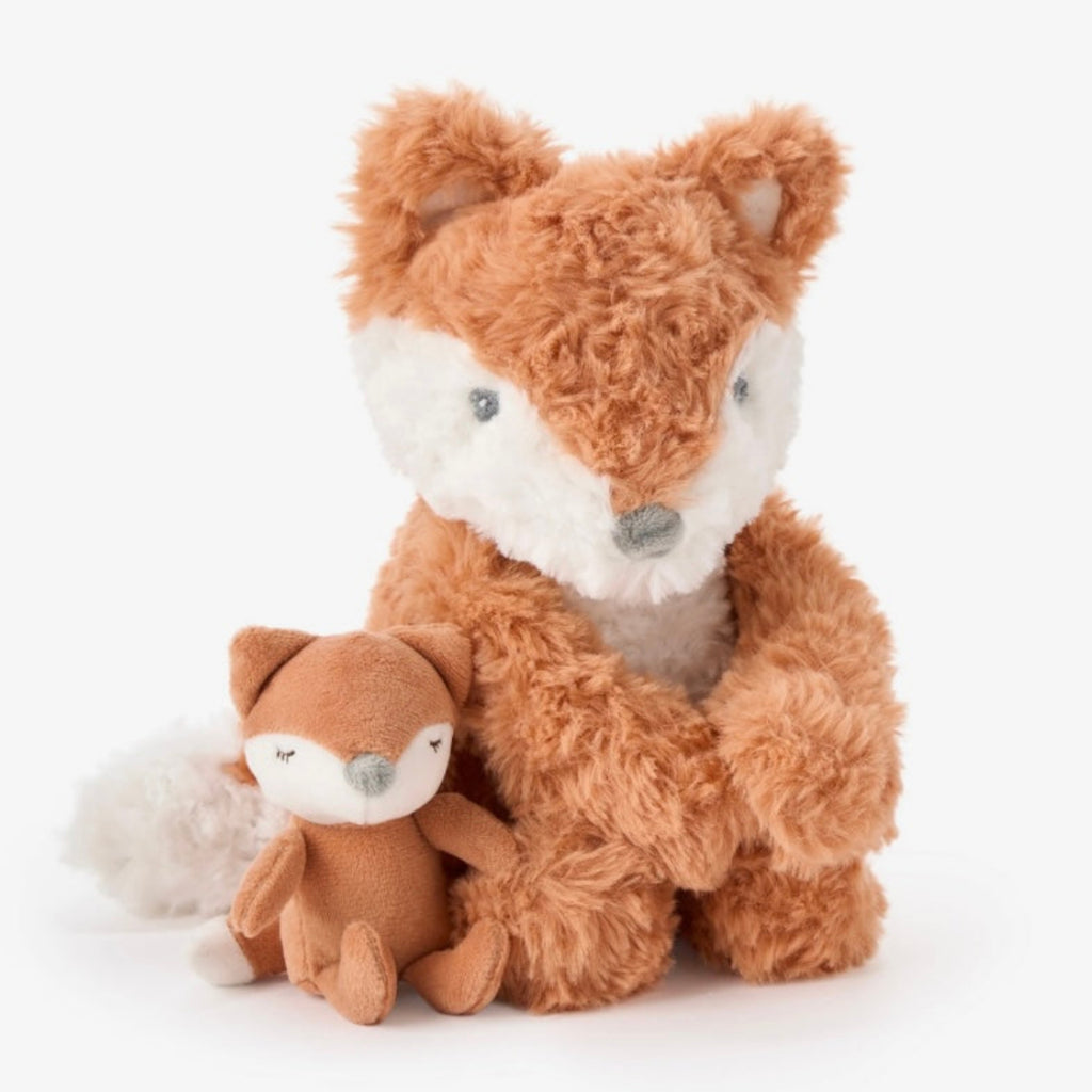 Two plush fox toys, one mama fox and one baby fox