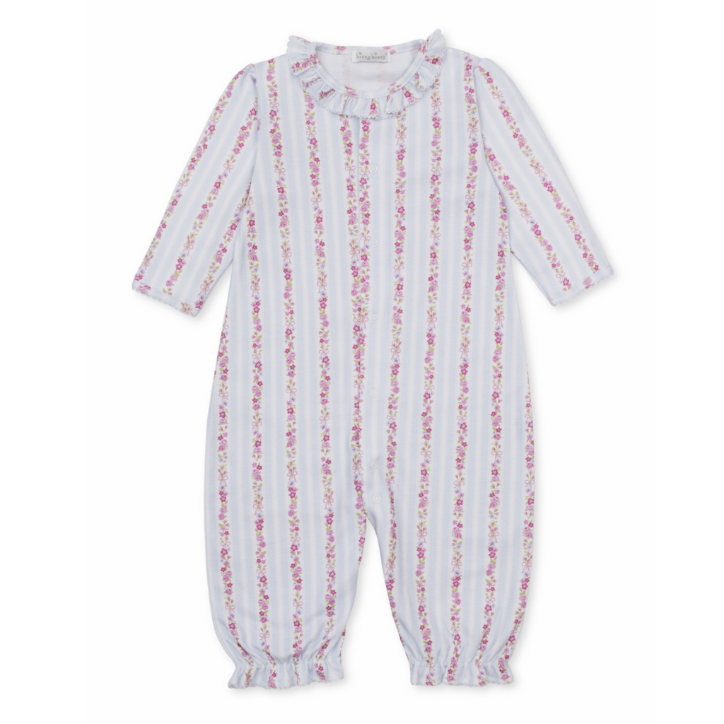 A baby girl long-sleeve converter gown playsuit with a Kissy Kissy brand label featuring light blue and white vertical stripes with pink floral and bow patterns and a ruffled collar.