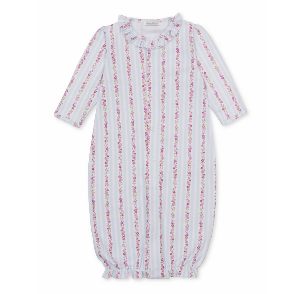 A baby girl converter gown with a Kissy Kissy brand label featuring light blue and white vertical stripes with pink floral and bow patterns and a ruffled collar.