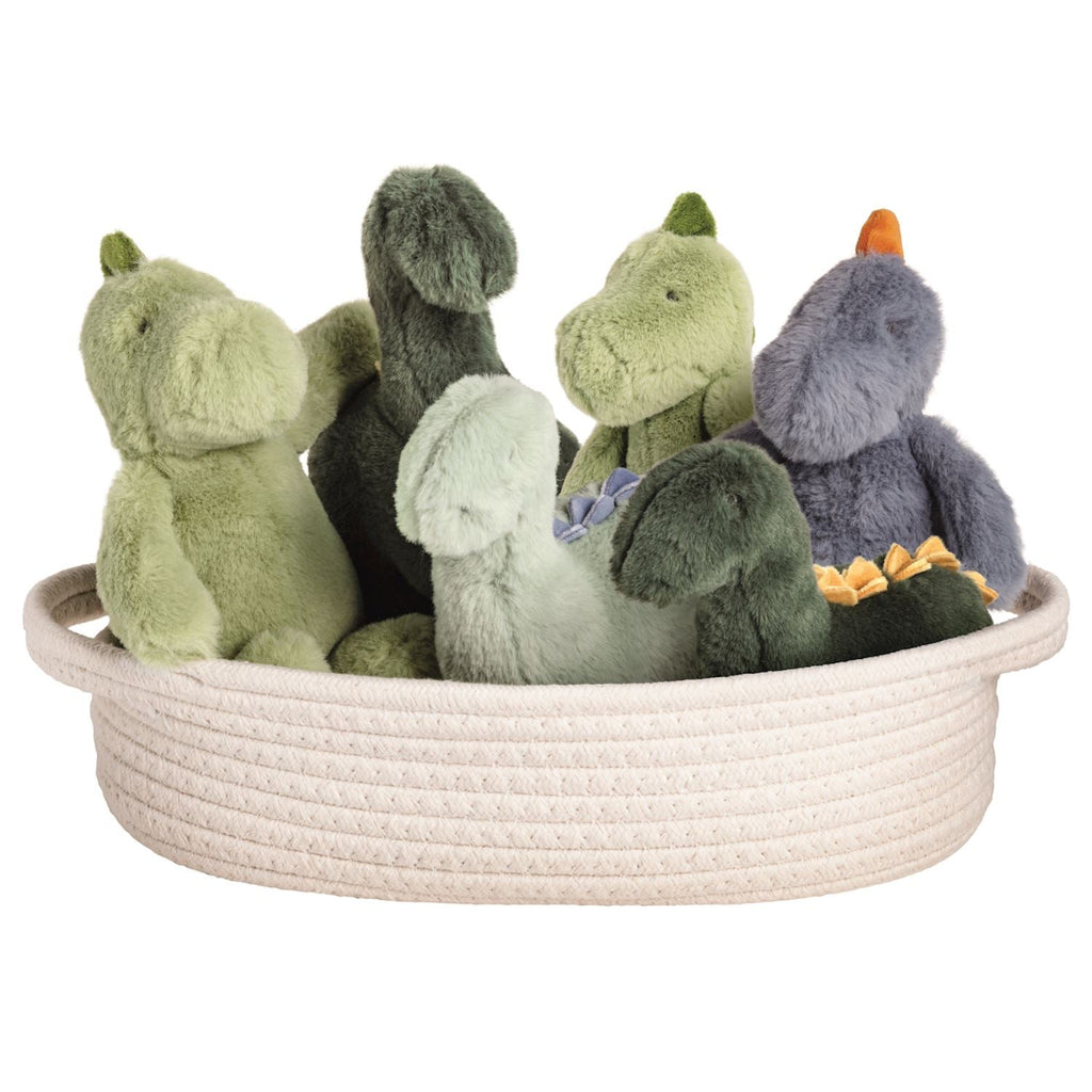 Basket with plush dinosaur toys